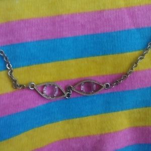 Purple diamond eyes necklace